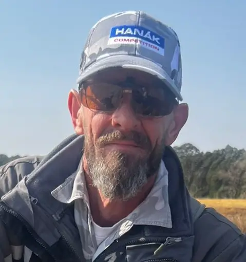 Shayne Prinsloo guiding a Yellowfish fly fishing client on the Vaal River near Parys